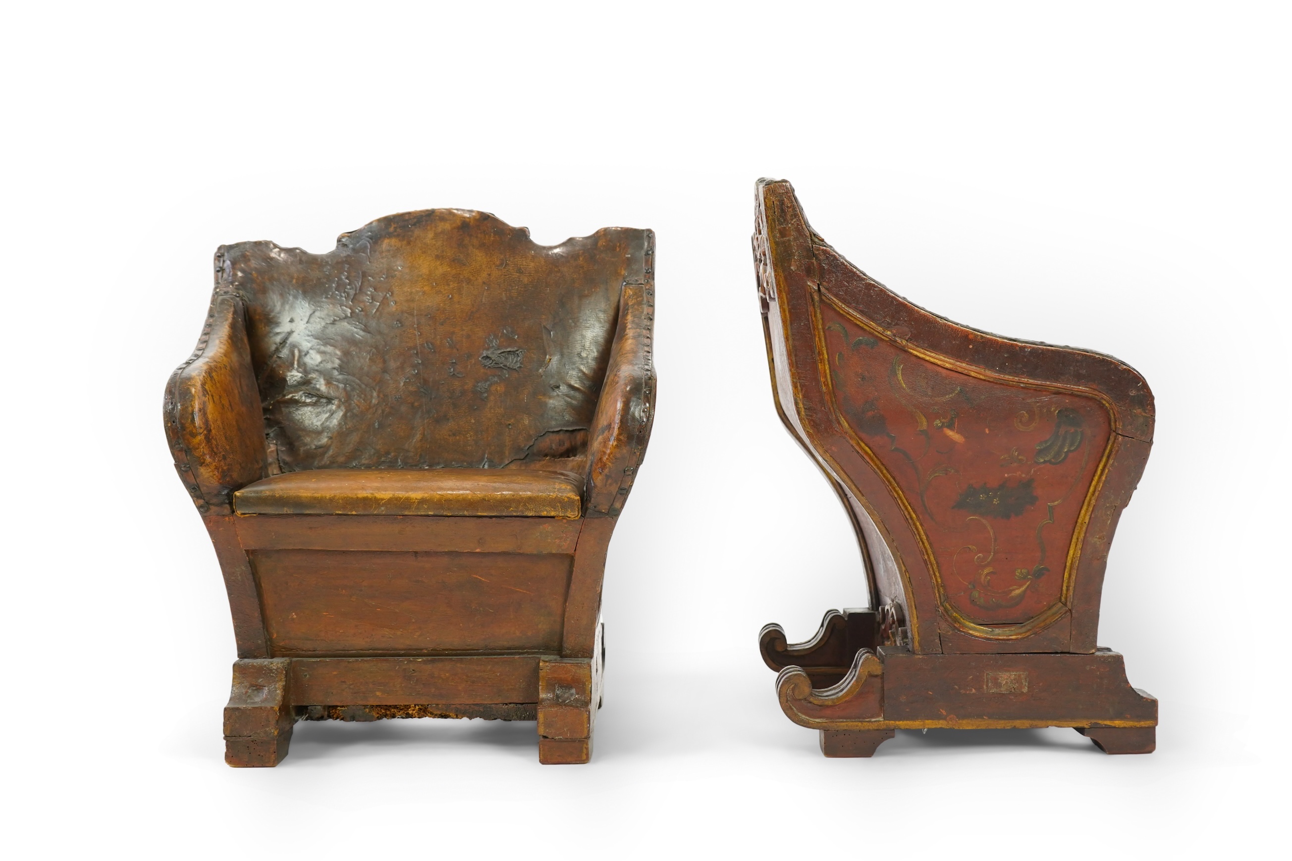 A pair of 19th century Venetian carved wood and tan leather Gondola seats